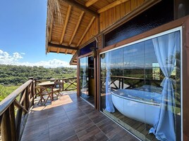 Romantic Bungalow, 1 Bedroom, Jetted Tub | Living area | Smart TV