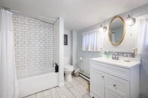 Combined shower/tub