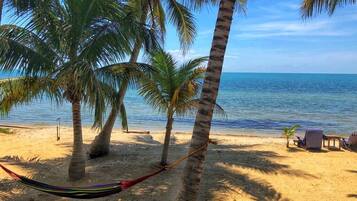 On the beach, sun loungers, beach towels