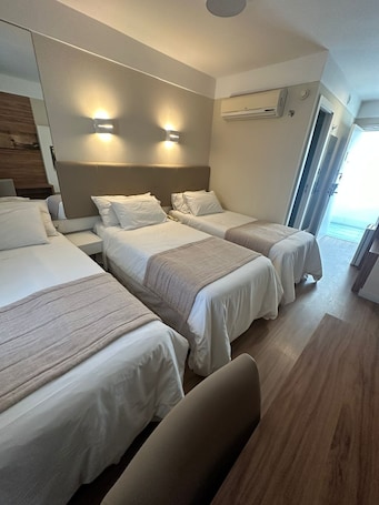 Deluxe Triple Room, 3 Twin Beds | 1 bedroom, free WiFi, bed sheets
