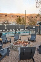 Outdoor pool, open 9:00 AM to 10:00 PM, pool umbrellas, sun loungers
