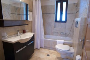 Bathtub, hair dryer