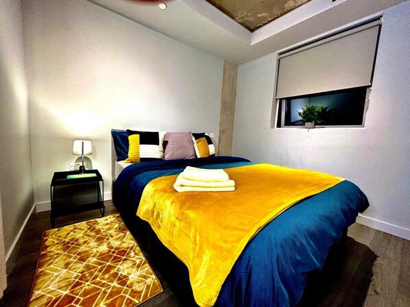 1 غرفة نوم ومكواة/لوح  كي وواي فاي مجانًا وملاءات أسرّة