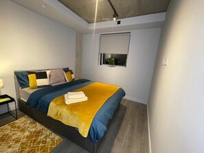 1 غرفة نوم ومكواة/لوح كي وواي فاي مجانًا وملاءات أسرّة