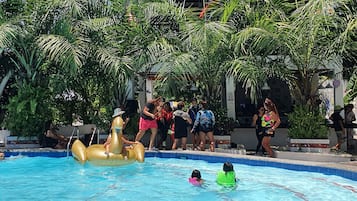 Outdoor pool, open 7:00 AM to 10:00 PM, sun loungers