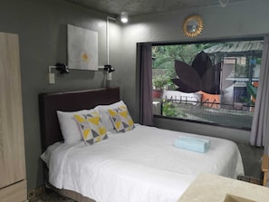 Deluxe Double Room, 1 Queen Bed, Non Smoking, Patio | Iron/ironing board, free WiFi, bed sheets - D Sanctum Resort (General Santos)