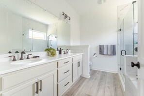 Hair dryer, towels, soap, shampoo