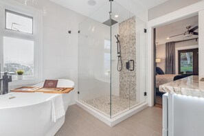 Bathtub, hair dryer, towels, soap