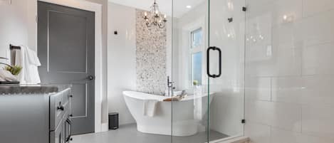 Bathtub, hair dryer, towels, soap