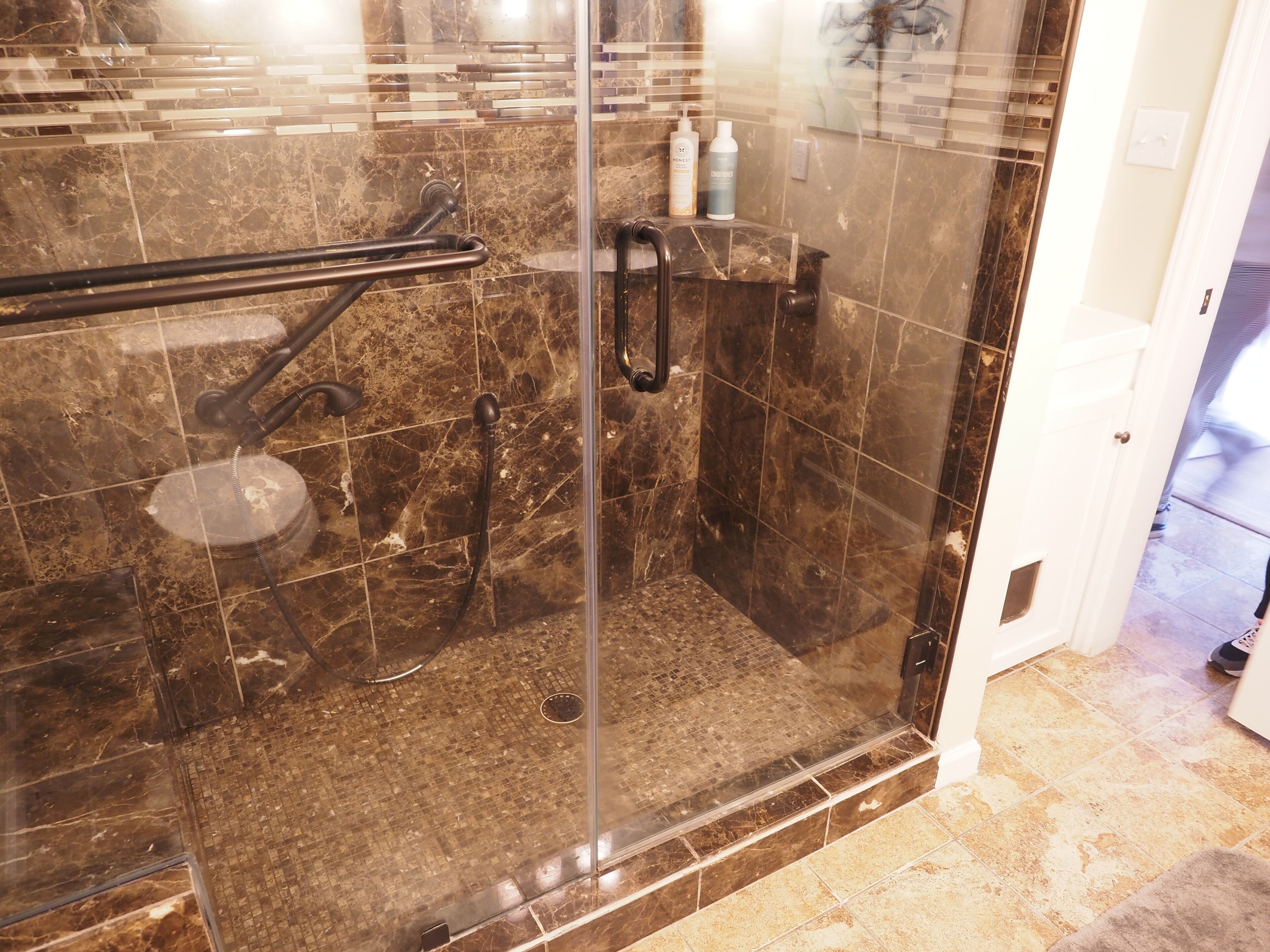 Combined shower/bathtub, hair dryer, towels, soap