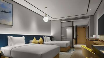 Premium bedding, down duvets, Select Comfort beds, in-room safe