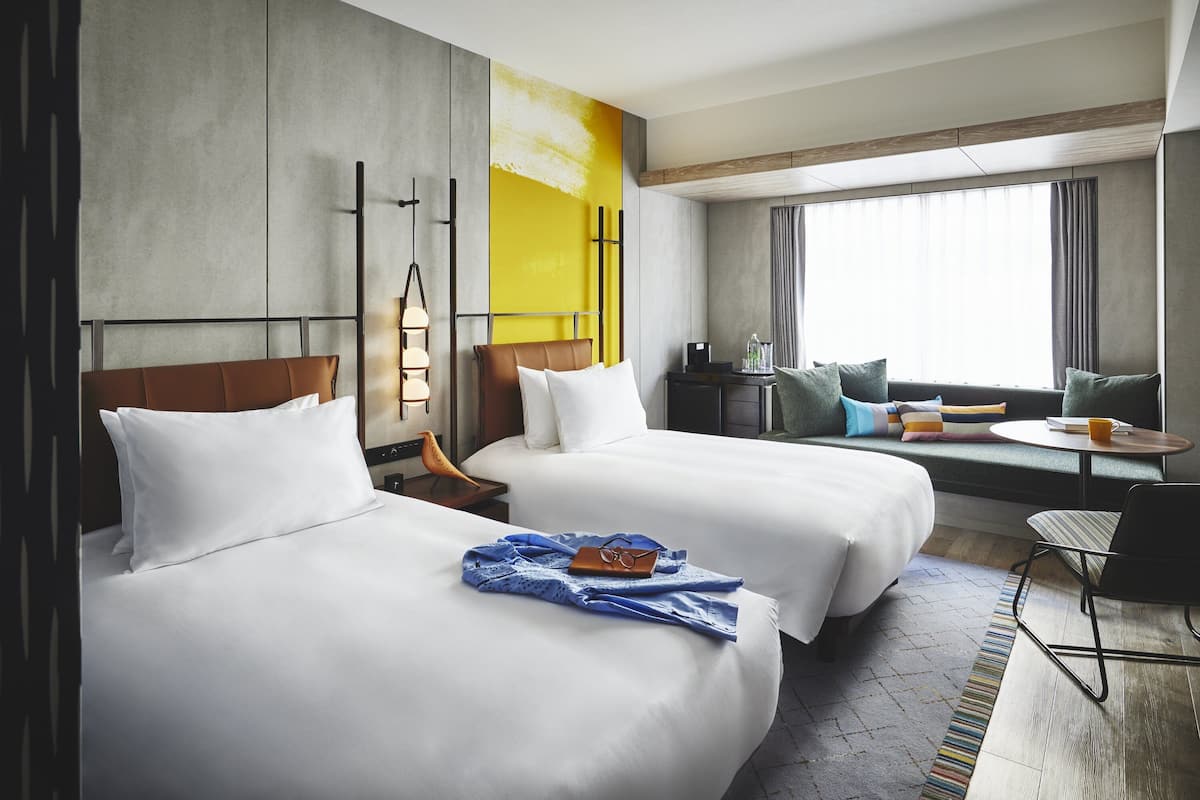 Premium bedding, down comforters, in-room safe, blackout drapes