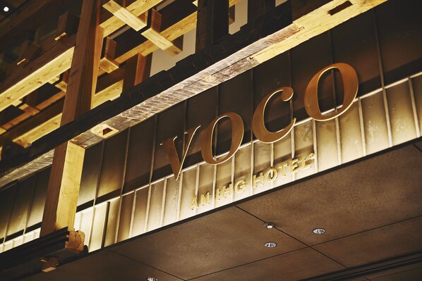 A hotel sign with the name 'YOCO' and 'ANH G HOTEL' visible. - voco Osaka Central by IHG (Osaka)