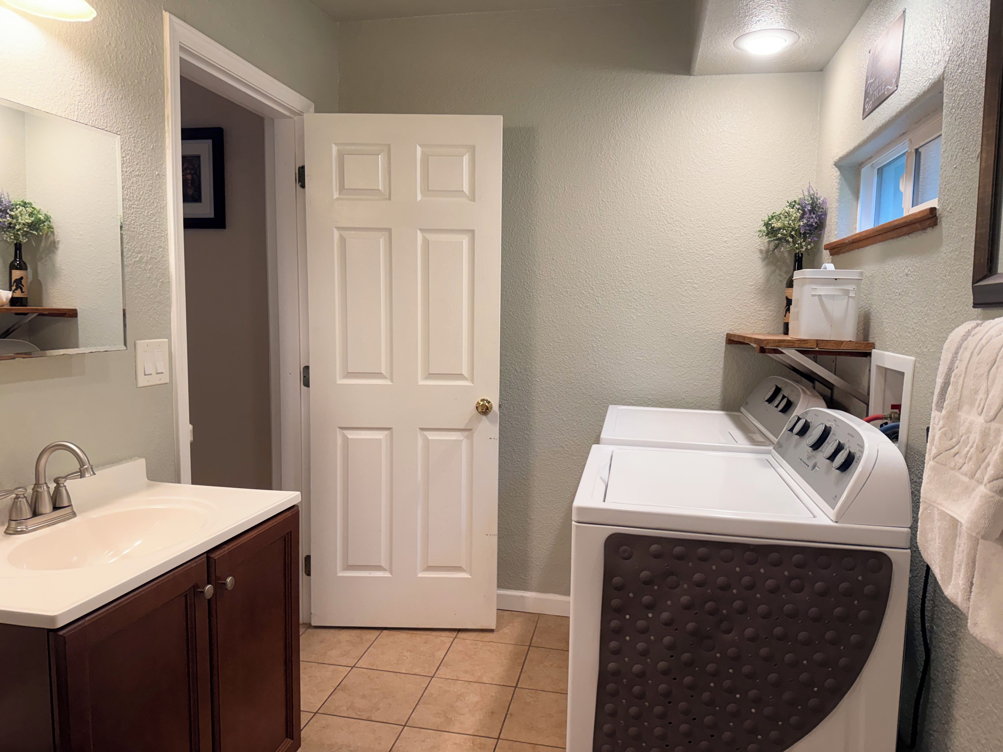 Shower, hair dryer, towels, shampoo