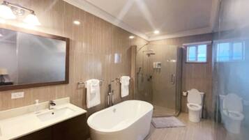 Royal Villa, Pool View, Beachside | Bathroom | Separate tub and shower, deep soaking tub, hydromassage showerhead