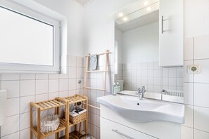 Ducha, secador de pelo, toallas