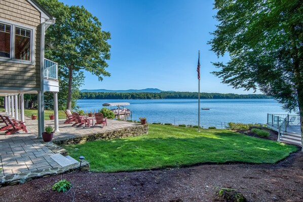 Terrace/patio - Stunning lakefront gem with full water view, beach access & dock (Moultonborough)