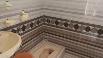 Quadruple Room | Bathroom | Free toiletries, slippers