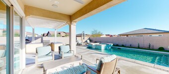 Home in a 55+ gated community with a private pool, grill, & furnished lanai