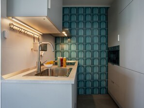 Fridge, microwave, cookware/dishes/utensils