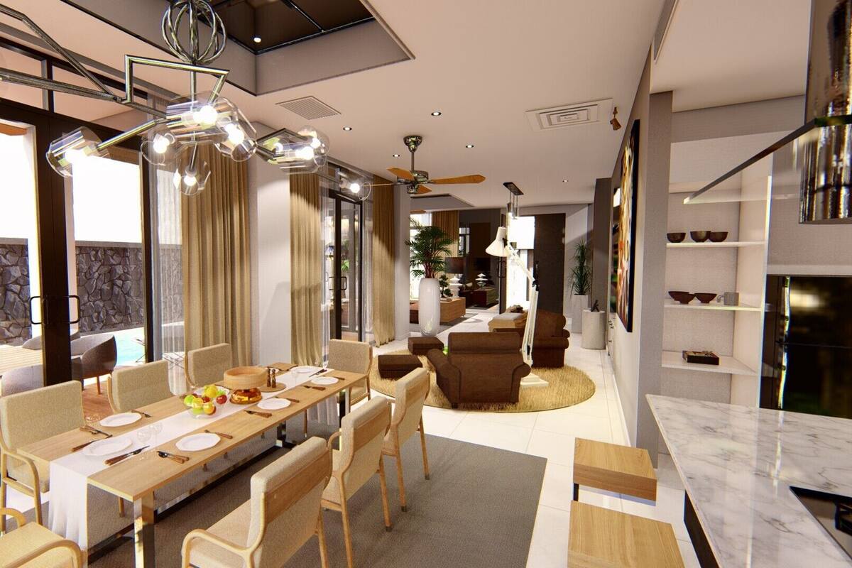 A modern dining area with a long table, chairs, and a ceiling fan.