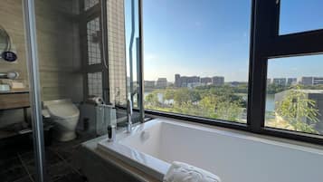 Deluxe Double Room | Bathroom | Eco-friendly toiletries, hair dryer, slippers, towels