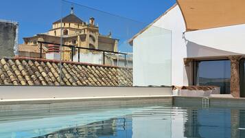 Outdoor pool, open 9:00 AM to 9:00 PM, pool umbrellas, sun loungers