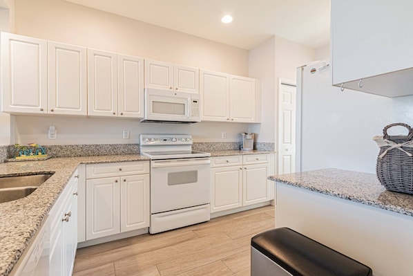 Fridge, microwave, dishwasher, coffee/tea maker