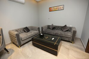 Double Room | Iron/ironing board, cribs/infant beds, bed sheets - The Orchard Hotel (Lahore)