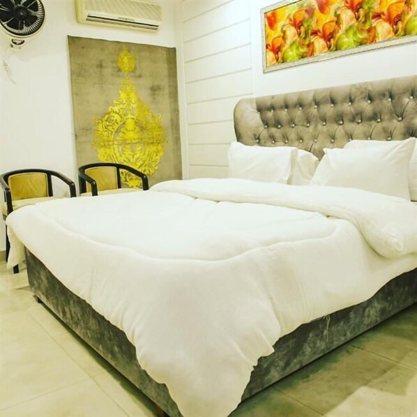 Habitación Deluxe | Tabla de planchar con plancha