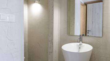 Shower, rainfall showerhead, hair dryer, towels