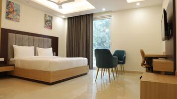 Quarto premium | Área de estar