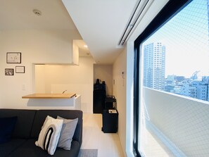 Deluxe Apartment | Desk, laptop workspace, blackout drapes, iron/ironing board - Flower Terrace Higashi Shinjuku (Tokyo)