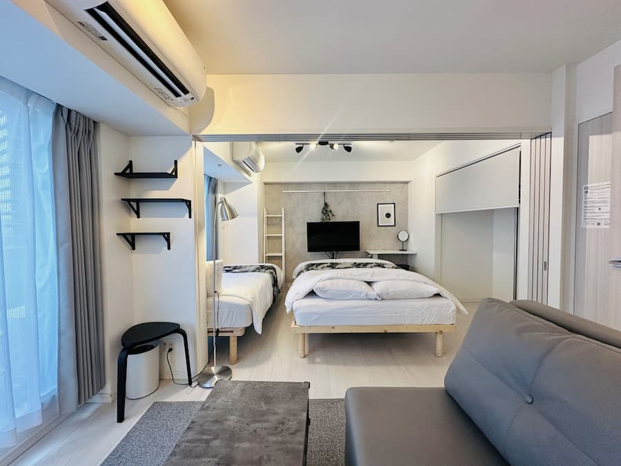 Deluxe Apartment | Desk, laptop workspace, blackout drapes, iron/ironing board