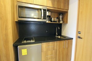 Fridge, microwave, stovetop, coffee/tea maker