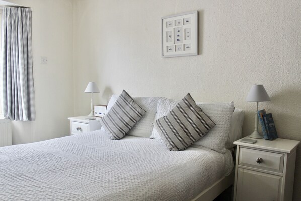 2 bedrooms, blackout curtains, iron/ironing board, travel cot