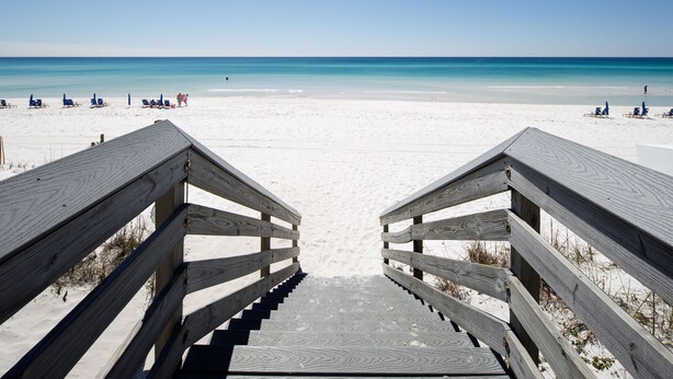 A wooden staircase leading to a beach with clear blue water and white sand. - CBH A - Where summer is a state of mind! (Fort Walton Beach)