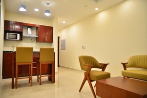 Suite | In-room safe, desk, laptop workspace, soundproofing