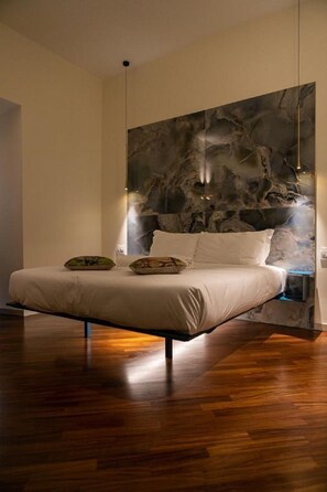 Deluxe Room, 1 King Bed, Non Smoking, City View | 1 bedroom, down duvets, minibar, in-room safe