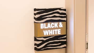 Classic Room, 1 King Bed, Non Smoking, City View | Down comforters, minibar, in-room safe, individually decorated