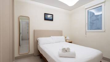 2 dormitorios, tabla de planchar con plancha, wifi gratis y ropa de cama