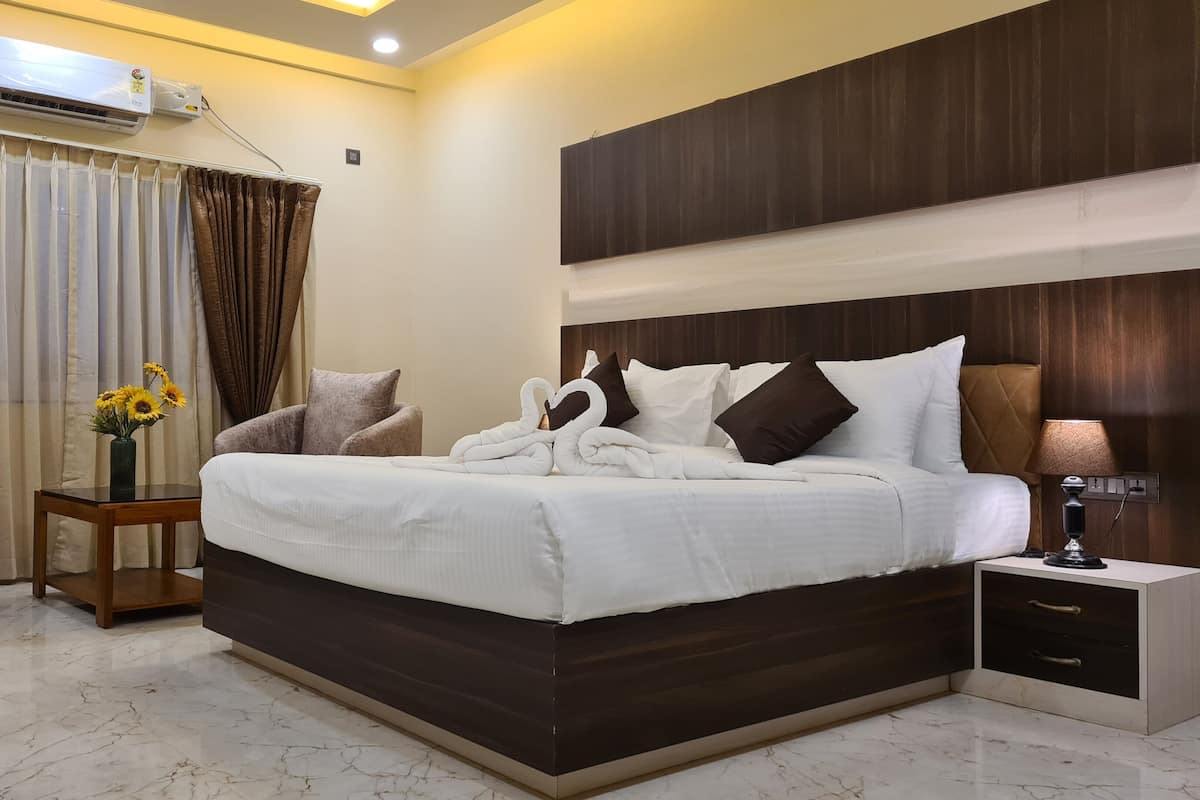 Premium Room | 1 bedroom, in-room safe, iron/ironing board, free WiFi