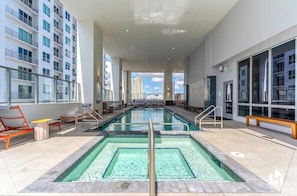 Unwind after a day of exploring in the shared rooftop jacuzzi.