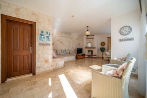 Flat-screen TV, fireplace, DVD player, table tennis