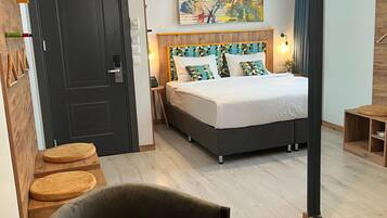 Minibar, coffres-forts dans les chambres, fer et planche Ă repasser