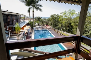 Outdoor pool - Pousada Magnus (Balneário Camboriú)