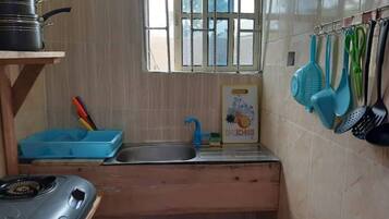 Shower, towels, soap, toilet paper