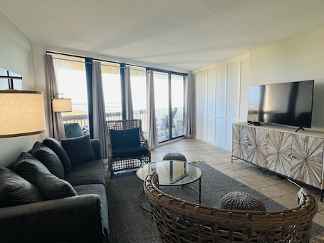 Living area. Beachside condo! Family-friendly, pool, hot tub, private balcony!