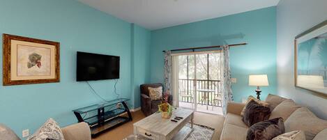 テレビ、DVD プレーヤー、テーブルサッカー台、書庫