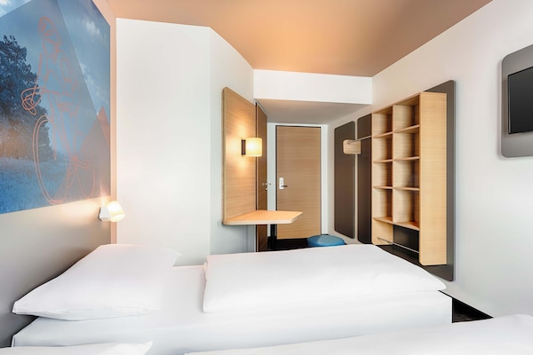 Wi-Fi de cortesia, roupa de cama